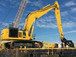 Excavator Mounted On Barge Working